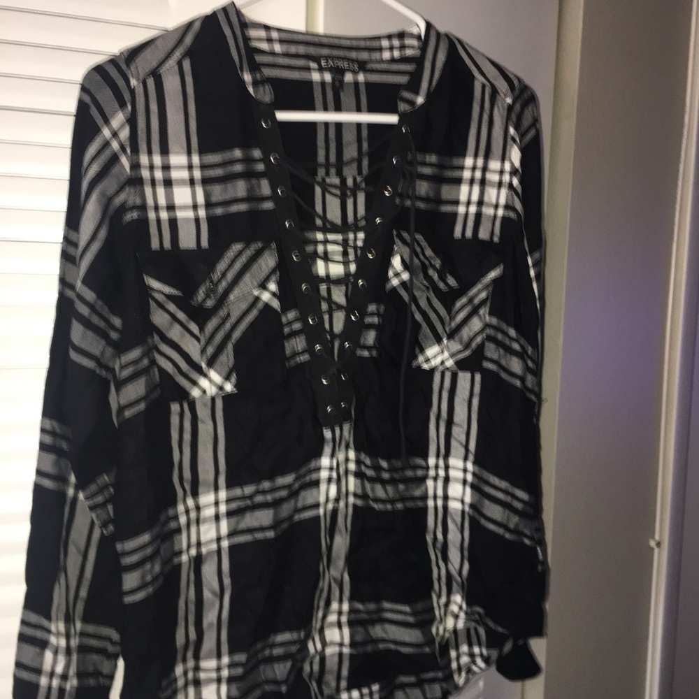 Plaid over-shirt.